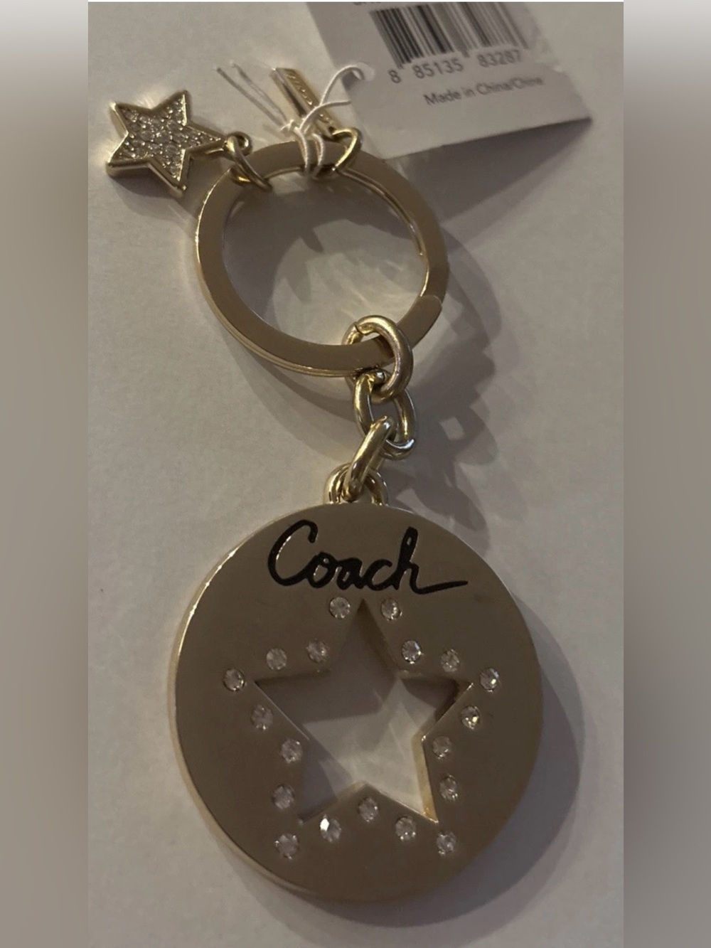 Coach Gold-Tone Star Cutout Charm Keyring with Crystal Accents